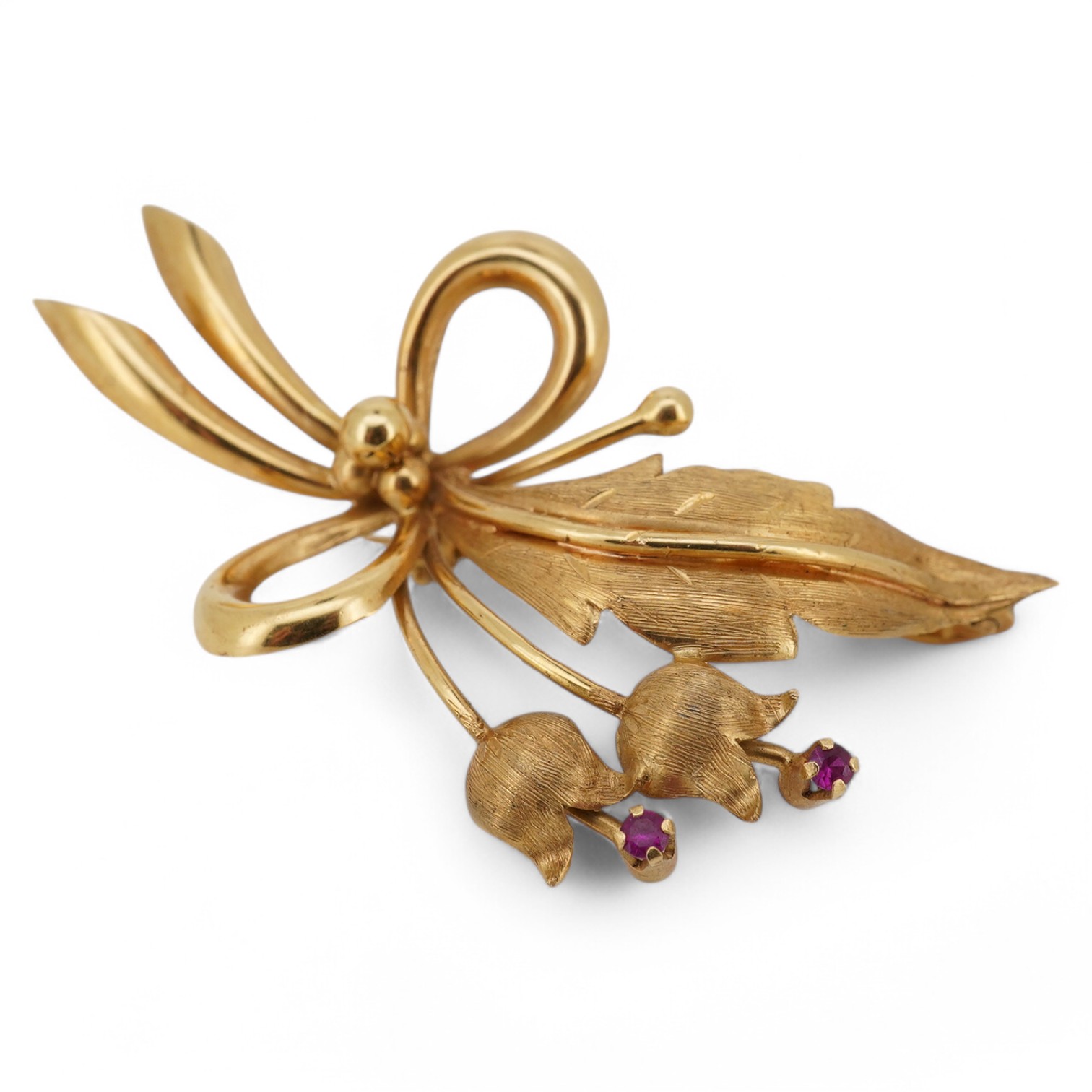 A modern 18k and two stone ruby set foliate spray brooch, 50mm, gross weight 6.7 grams. Condition - fair to good